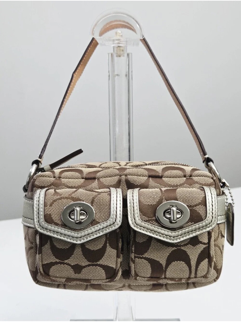 vintage Coach Mini Legacy signature canvas bag featuring dual front pockets